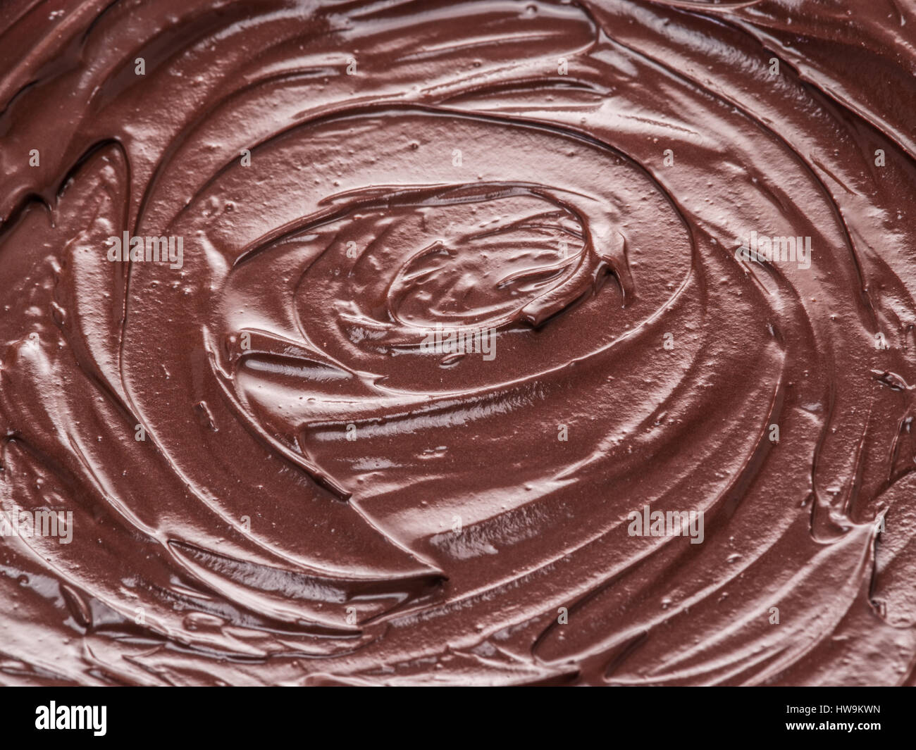 Melted chocolate or chocolate glaze. Macro. Stock Photo