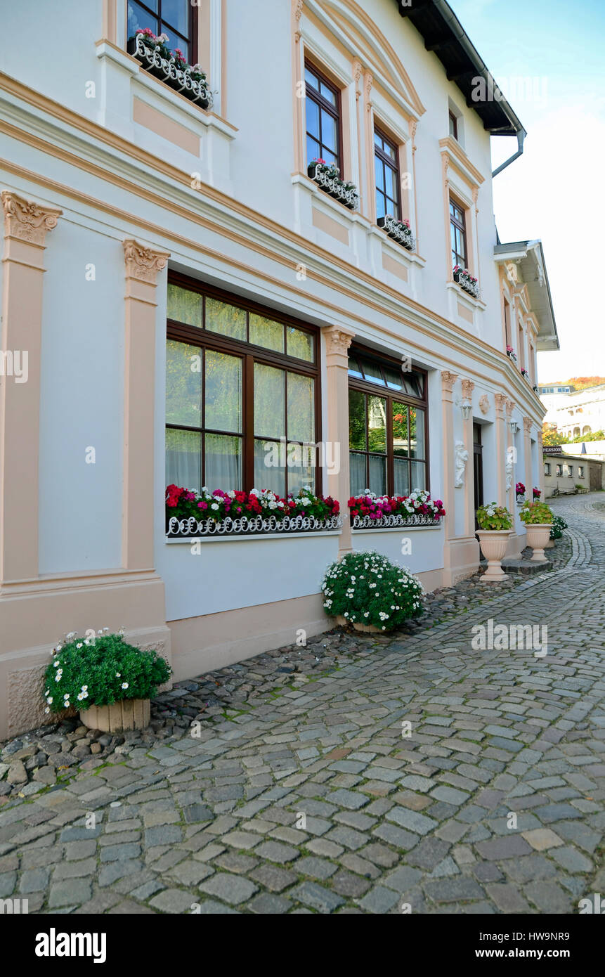Small street with typical building (hotel) in old town of Sassnitz, Ruegen Island Stock Photo
