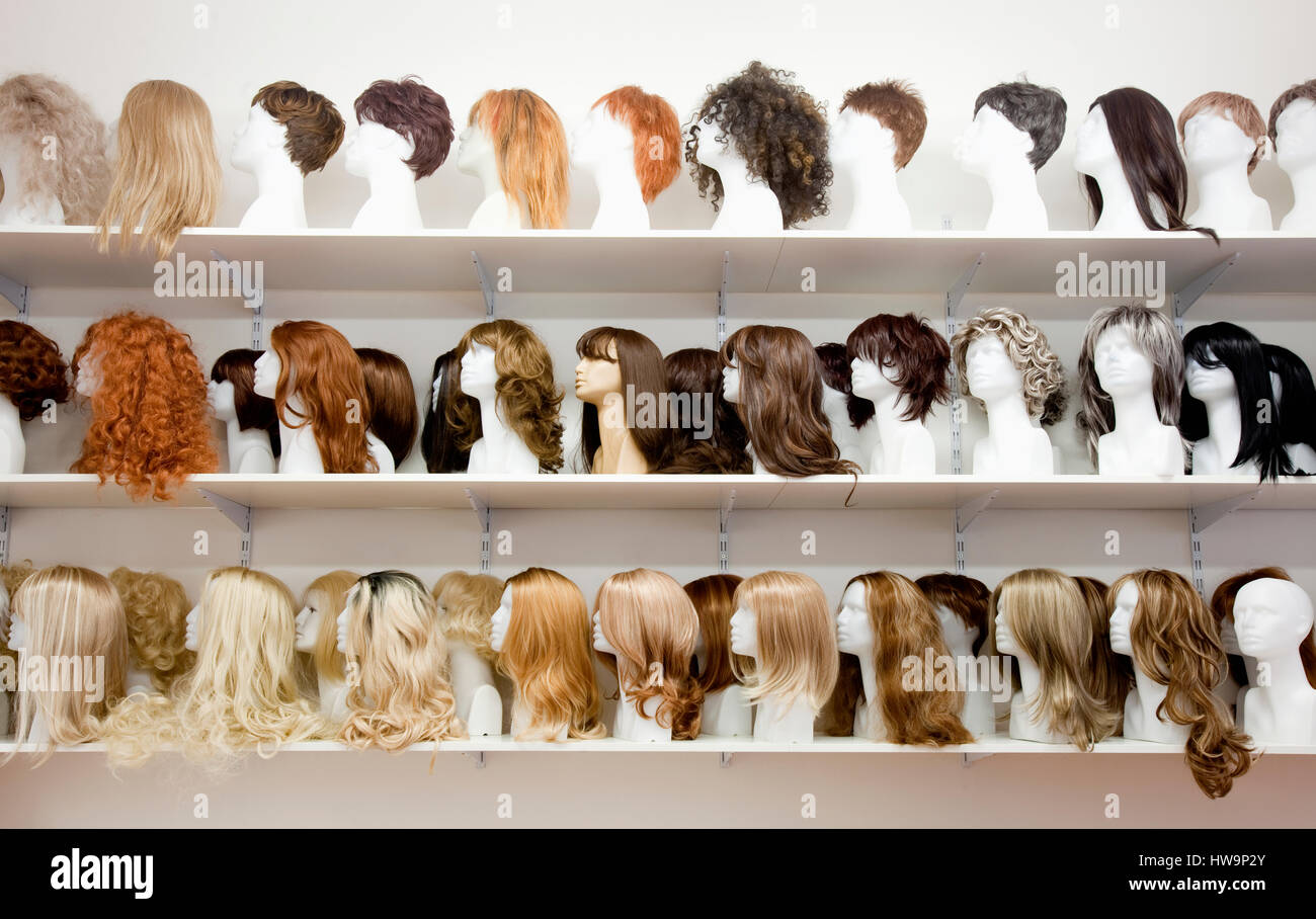 Row of Mannequin Heads with Wigs on the Shelf Stock Photo - Alamy