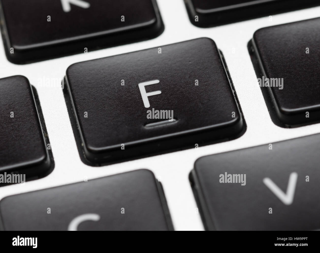 Close up of home Key showing bump on letter F Stock Photo