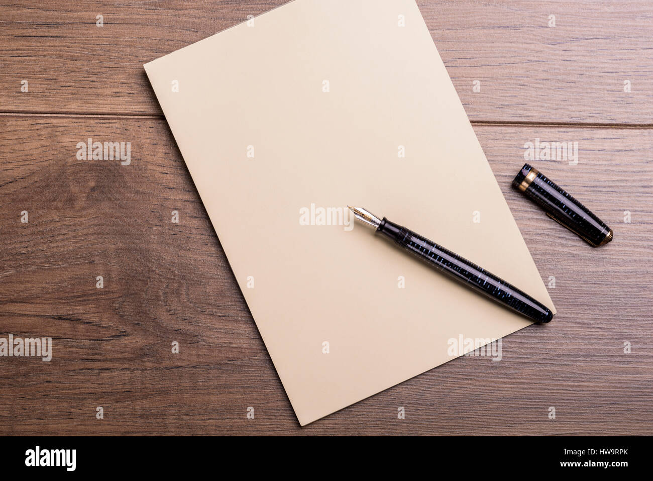 Fountain pen pad paper letter. Blank paper and pen shot from overhead Stock Photo Alamy