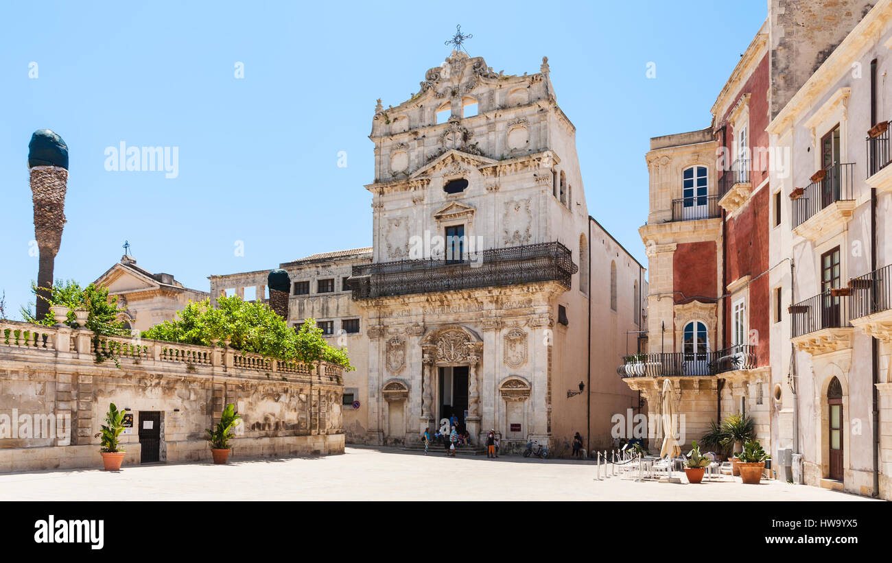 SYRACUSE, ITALY - JULY 3, 2011: visitors near Chiesa di Santa Lucia alla Badia on piazza Duomo in Syracuse in Sicily. The city is a historic town in S Stock Photo