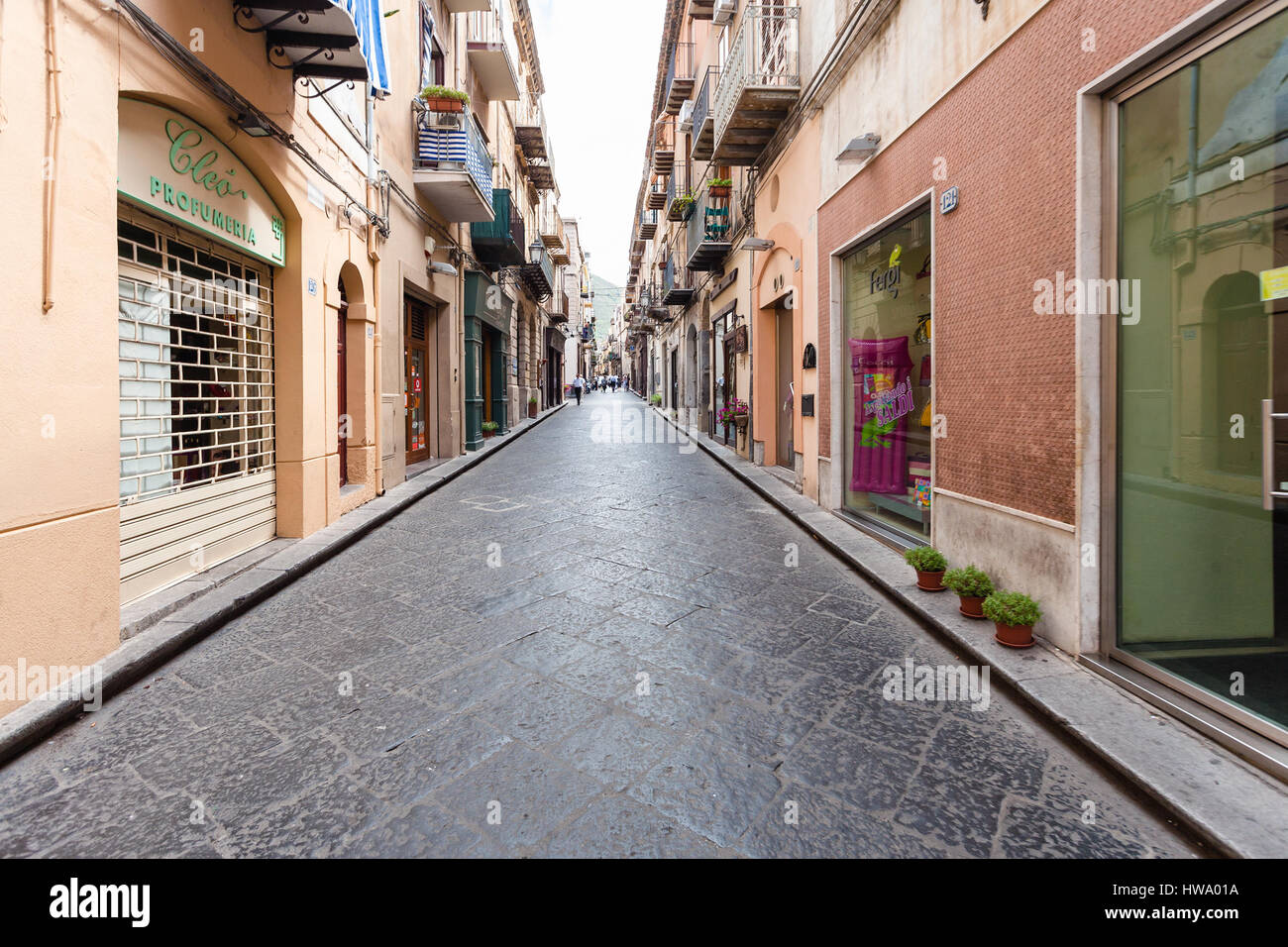 CEFALU, ITALY - JUNE 25, 2011: Corso Ruggero street in Cefalu in Sicily. The town is one of the major tourist attractions in the Palermo - Messina reg Stock Photo