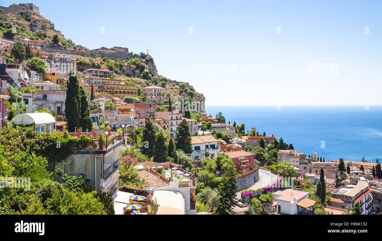 travel to Italy - Taormina city skyline from Castelmola village in Sicily  in summer day Stock Photo - Alamy