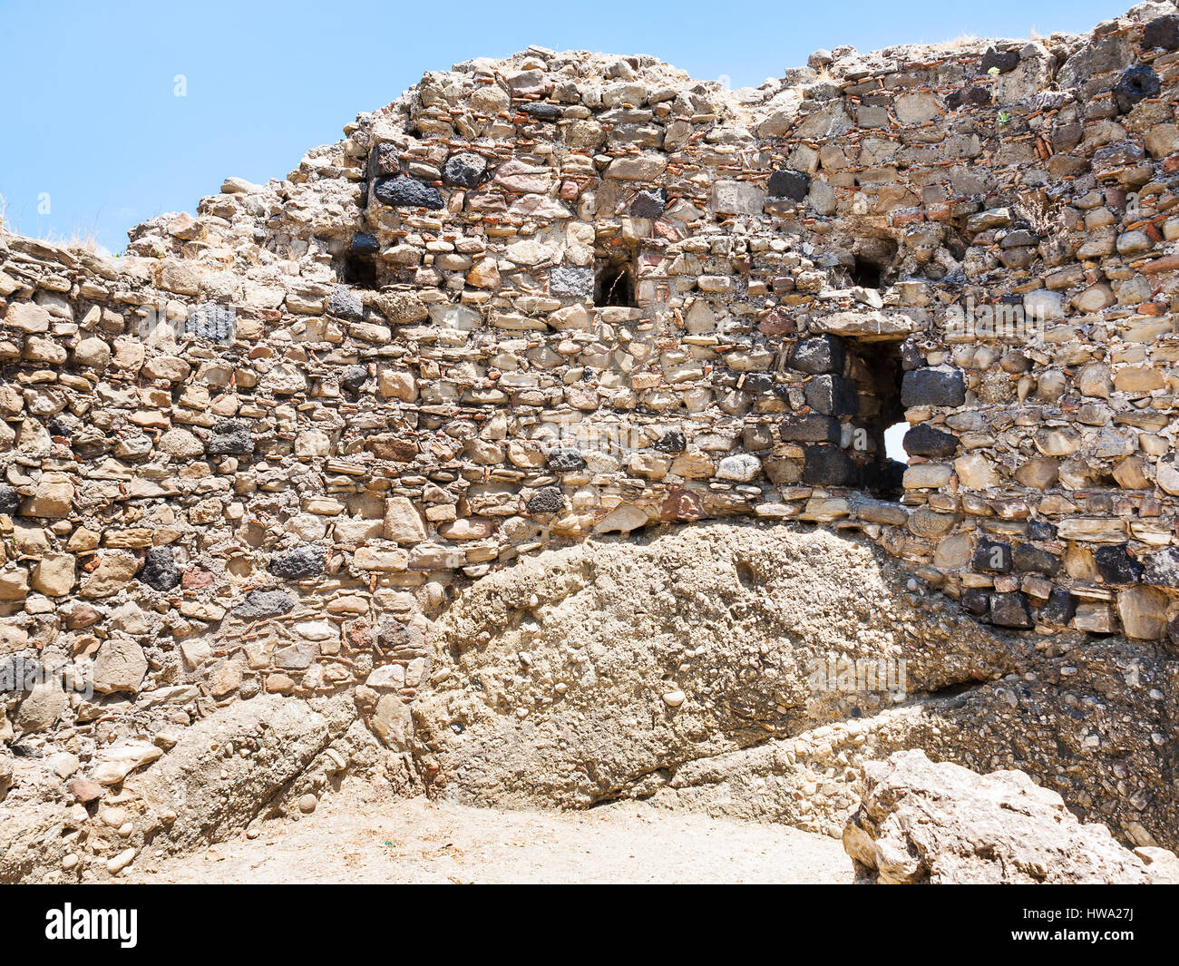 travel to Italy - ruined walls of ancient castle in Calatabiano town in Sicily Stock Photo