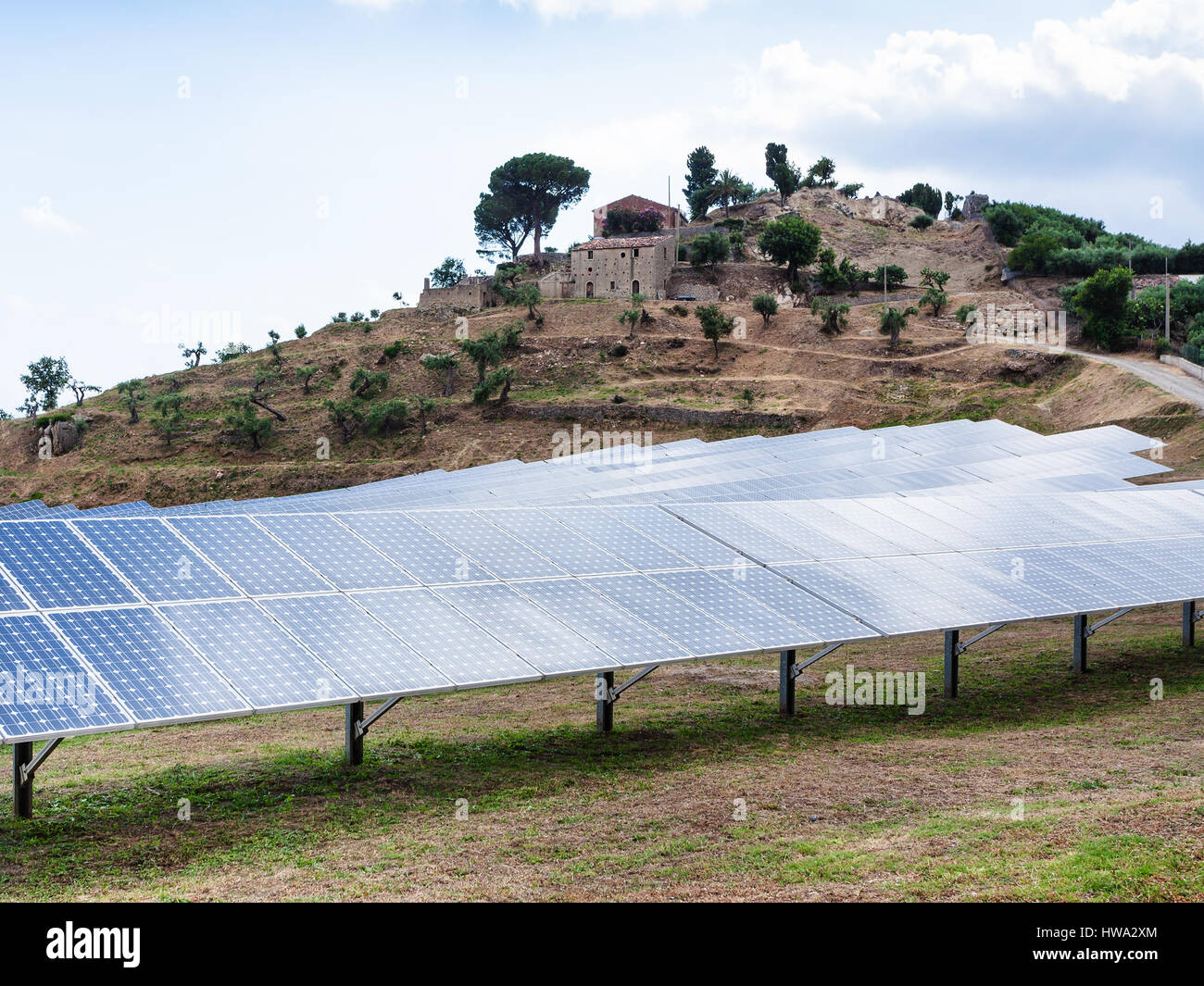 travel to Italy - solar panels near village in Sicily Stock Photo