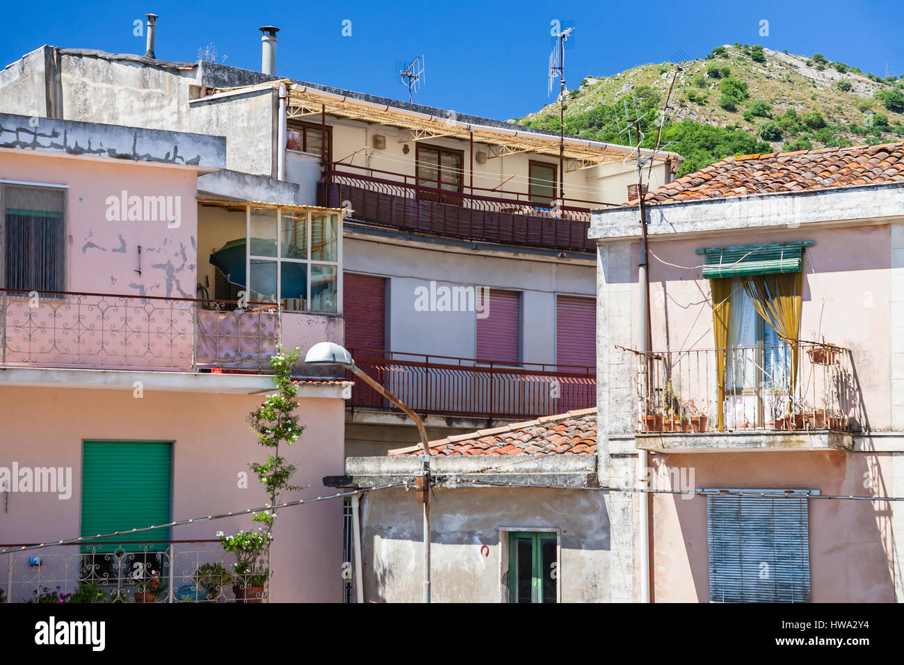 travel to Italy - urban house in Francavilla di Sicilia town in Sicily Stock Photo