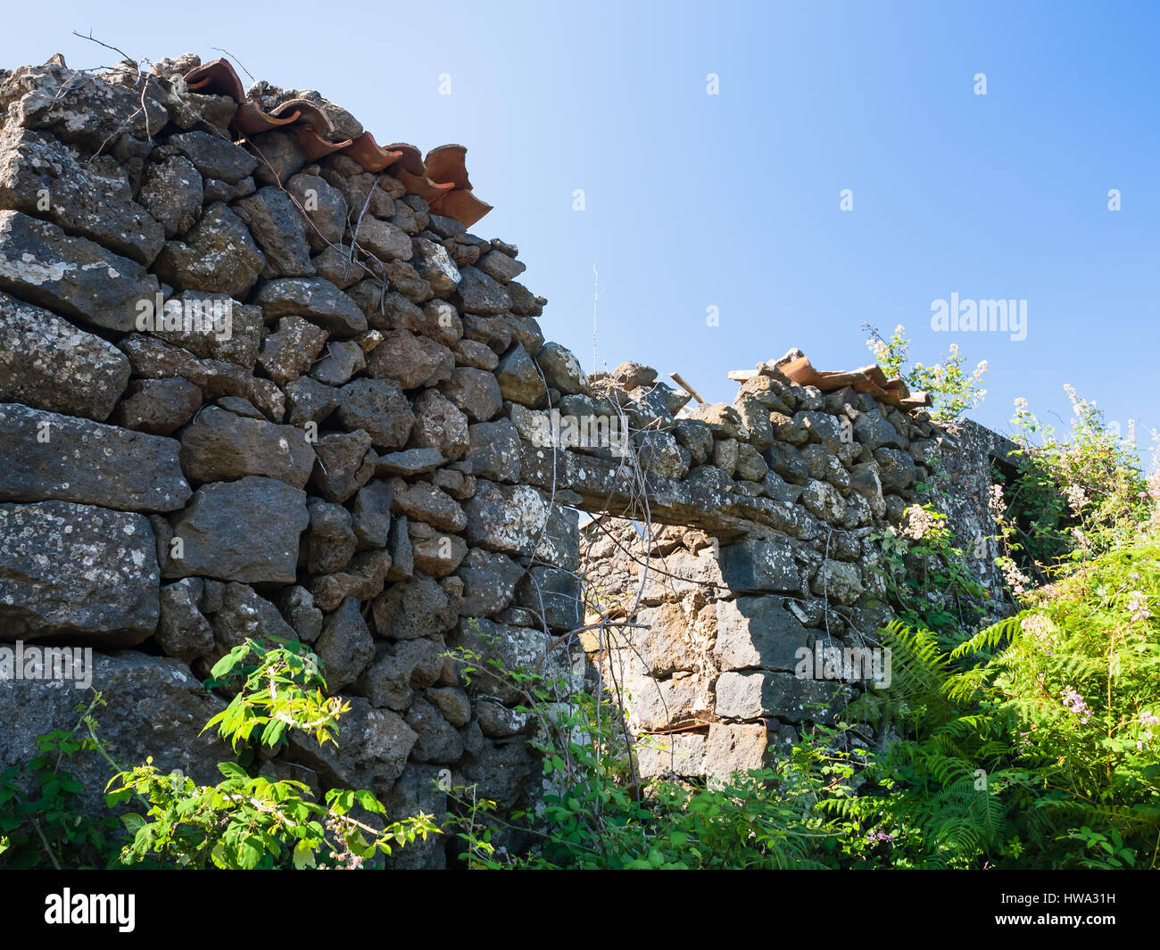 travel to Italy - abandoned rural house after volcano Etna eruption in Sicily Stock Photo