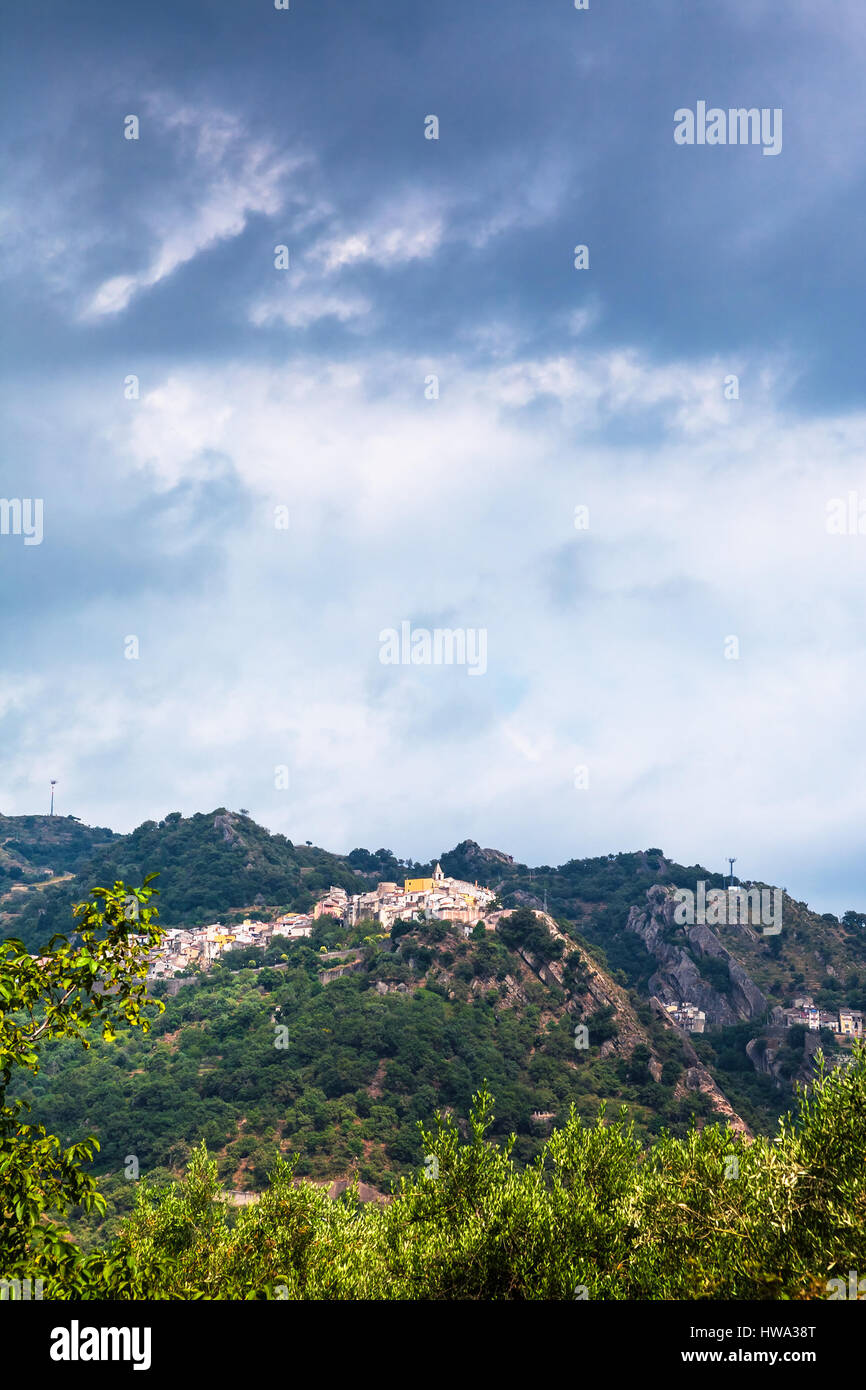 travel to Italy - rain clouds over Castiglione di Sicilia town in Sicily Stock Photo