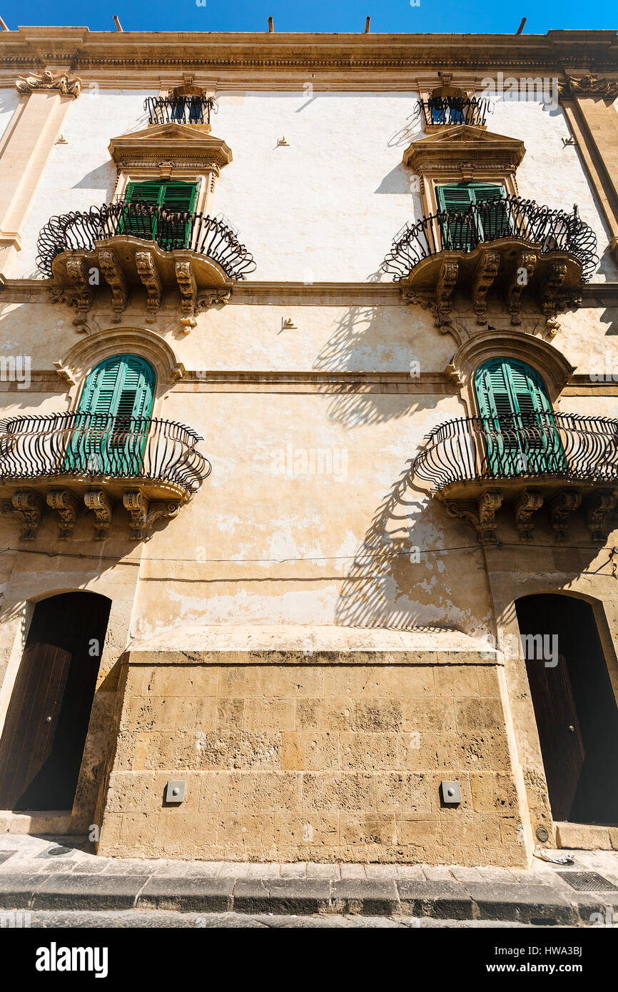 travel to Italy - facade of urban house in Noto city in Sicily Stock Photo