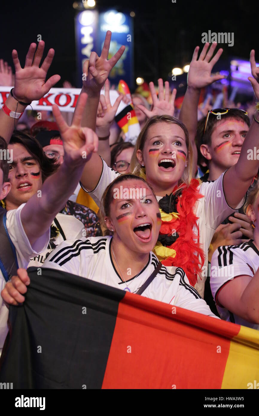 Berlin, Germany, July 8th, 2014: Fans watch FIFA Worldcup game Germany v Brazil on large screen. Stock Photo