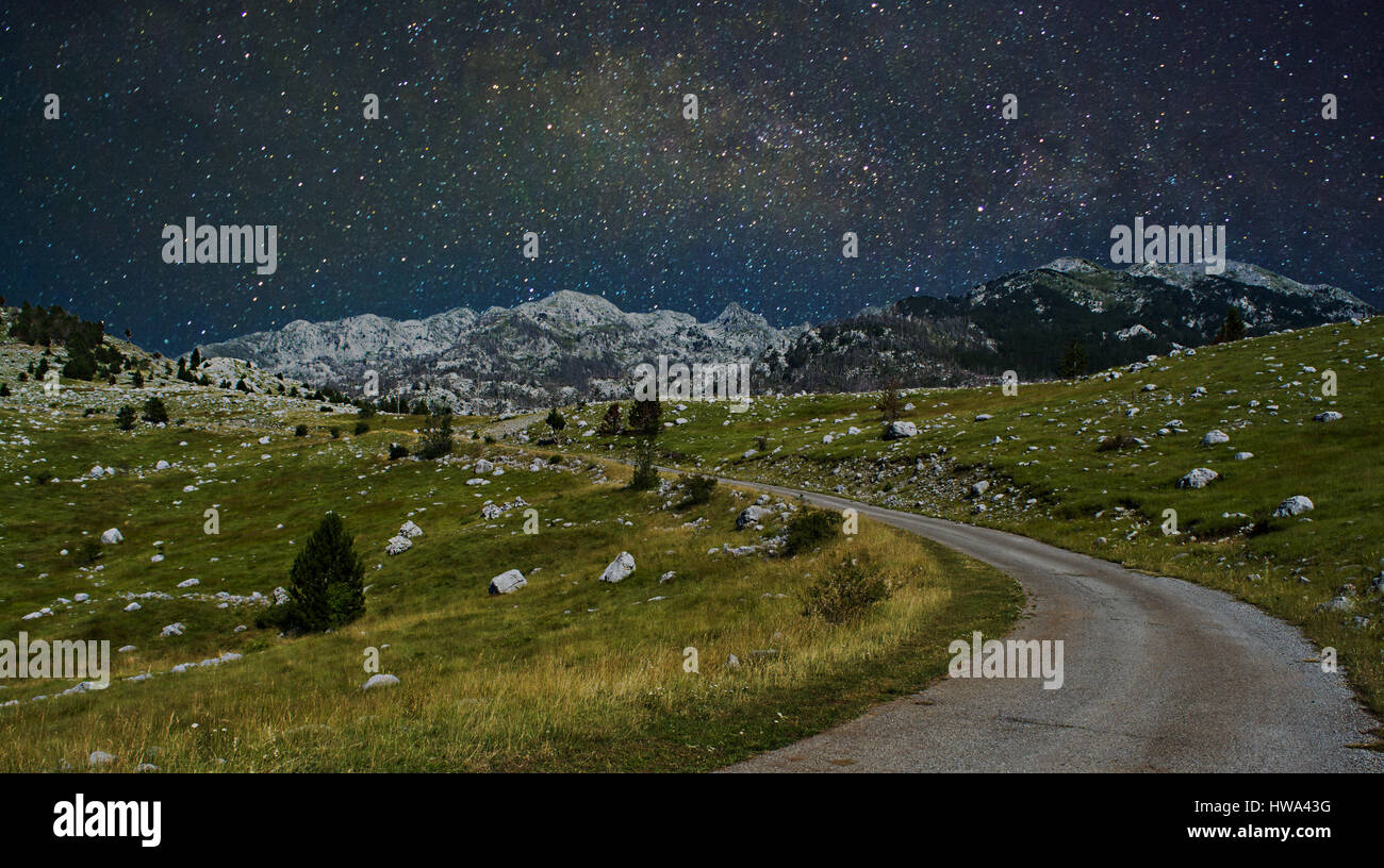 Milky way over mountain meadow hi-res stock photography and images - Alamy