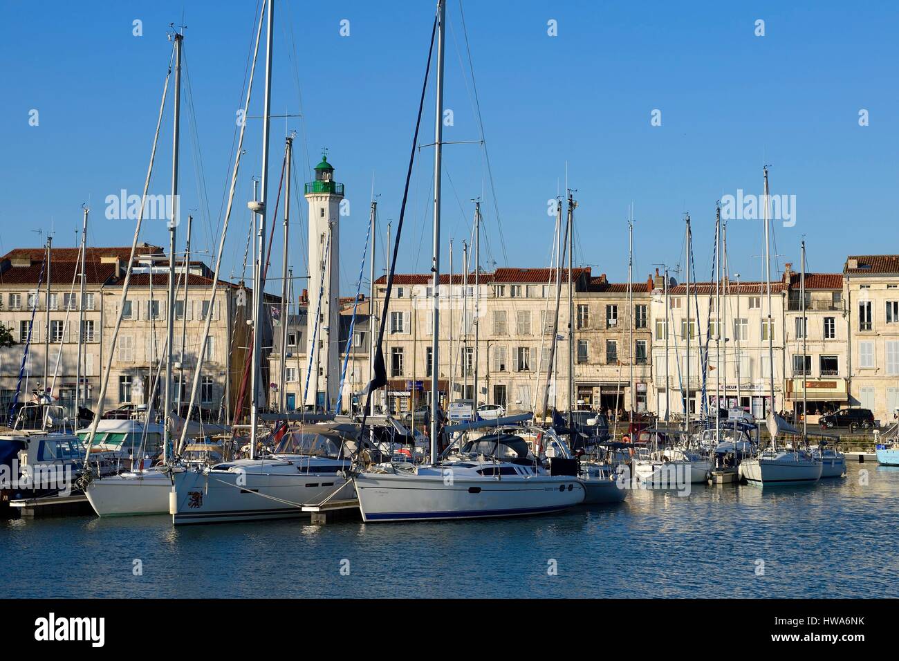 France, Charente-Maritime, La Rochelle, the wet dock of the Old Port and its lighthouse Stock Photo