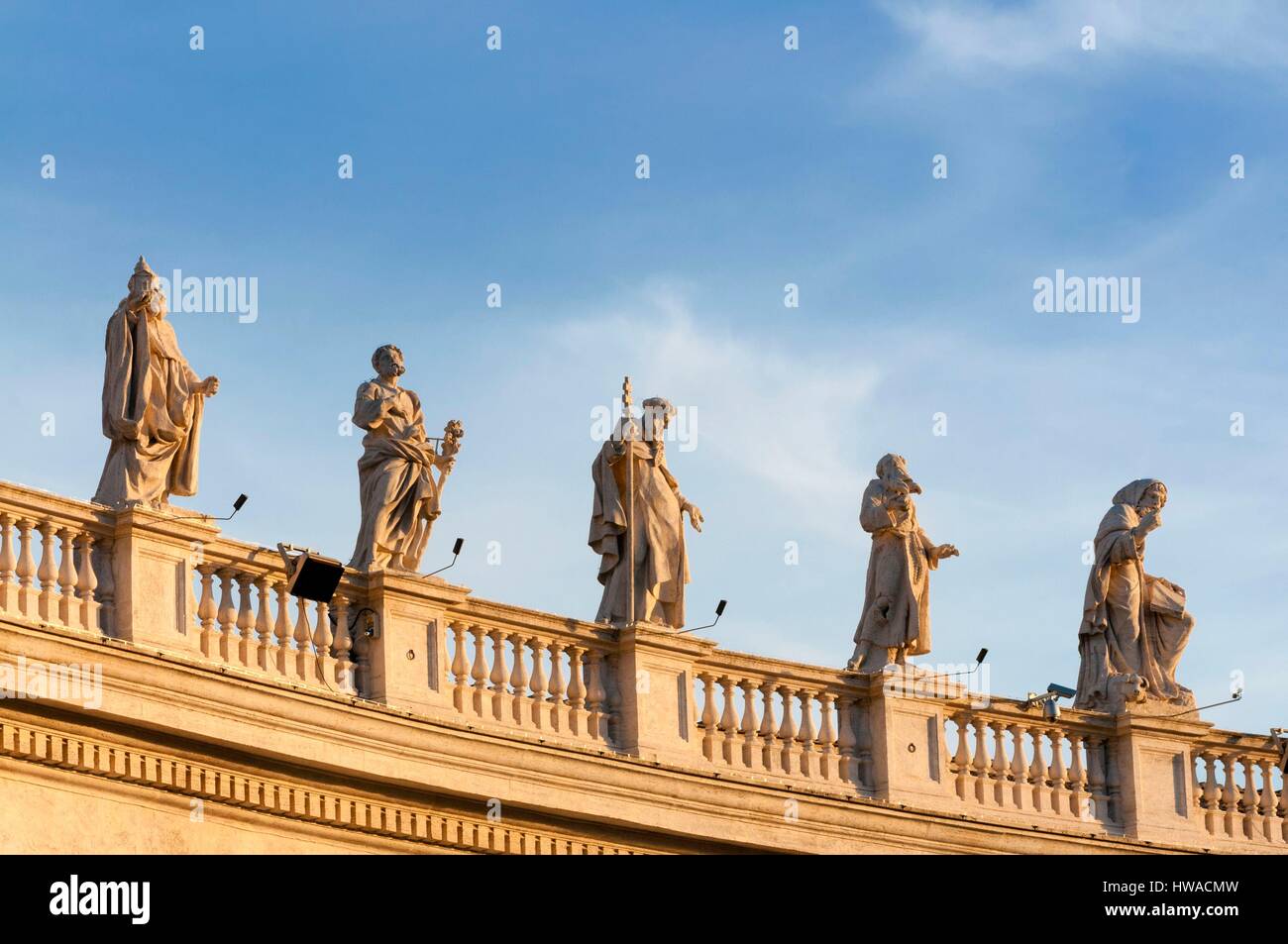 Italy, Latium, Rome, Vatican City, listed as World Heritage by UNESCO, Bernini's colonnade, Piazza San Pietro, St. Peter's square, Statues of saints Stock Photo