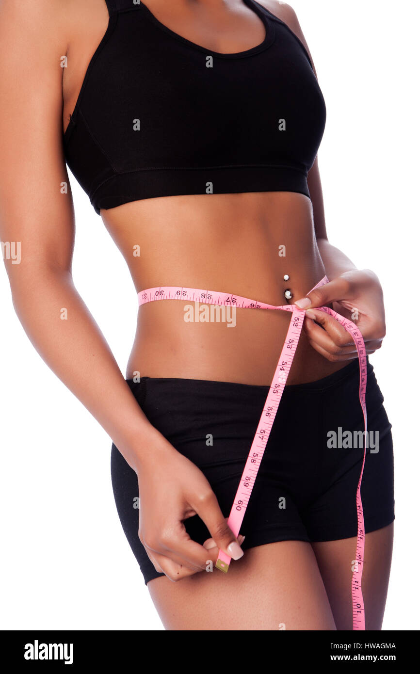 Healthy fit woman measuring waste, weightloss concept. Stock Photo