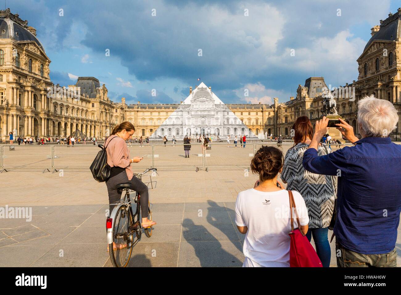 France, Paris, the Louvre Pyramid disappears for a month (may 25th to June 27th 2016) thanks to a photographic collage of French artist JR Stock Photo