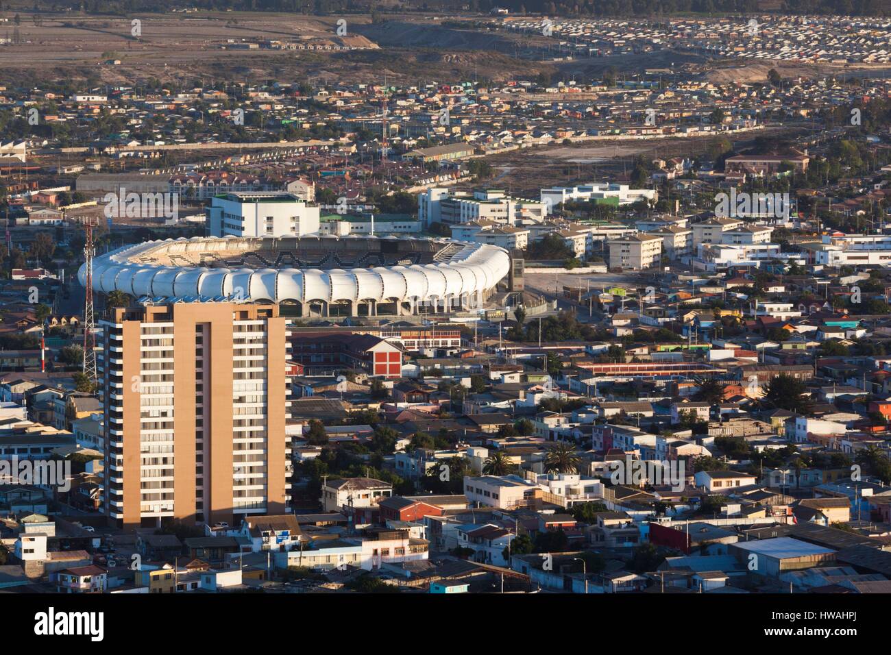 Chile, Coquimbo, elevated city view with Sanchez Rumoroso Stadium from the Cruz del III Milenio cross, dusk Stock Photo