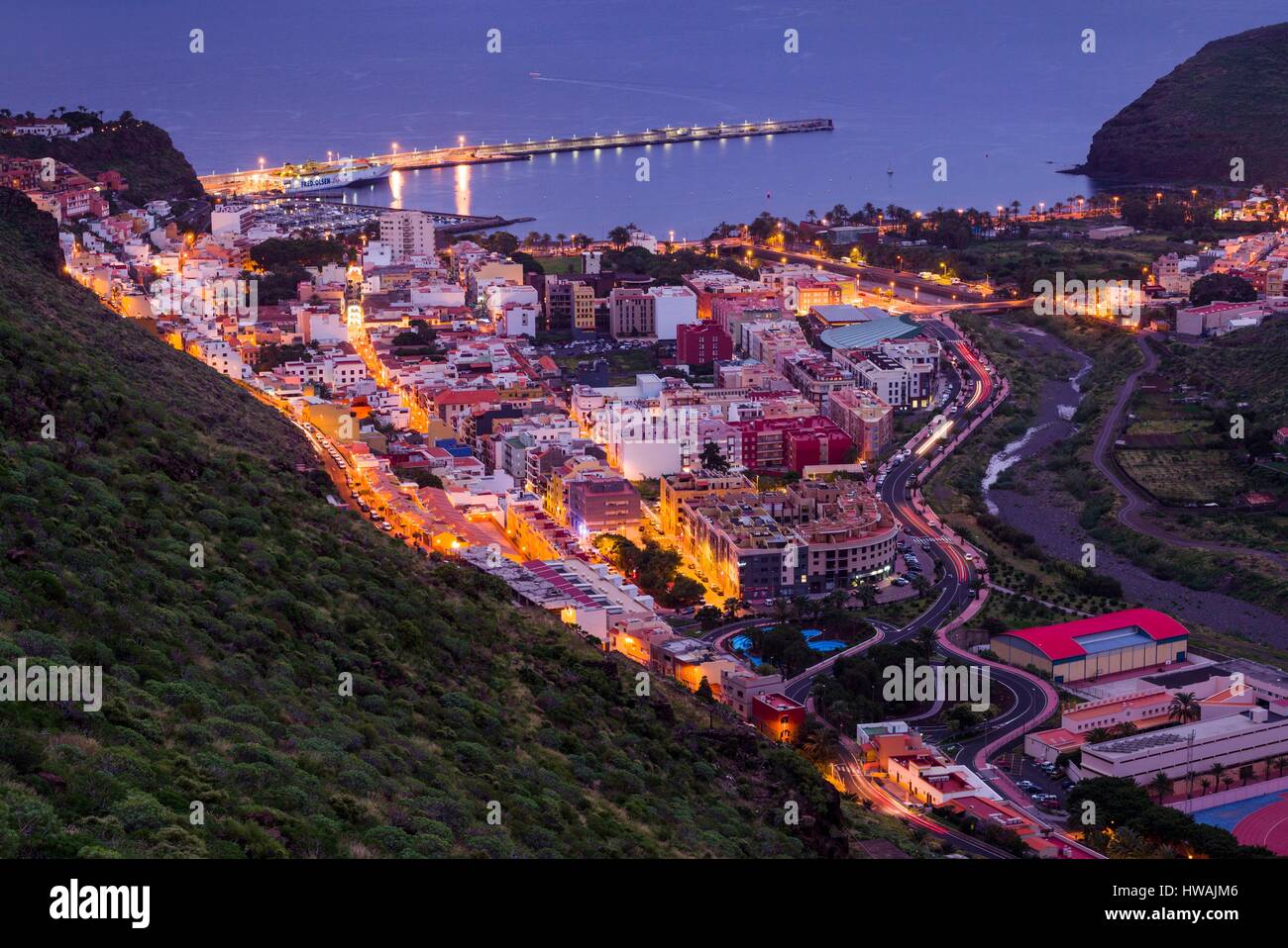 Spain, Canary Islands, La Gomera, San Sebastian de la Gomera, elevated view of town and port dawn Stock Photo