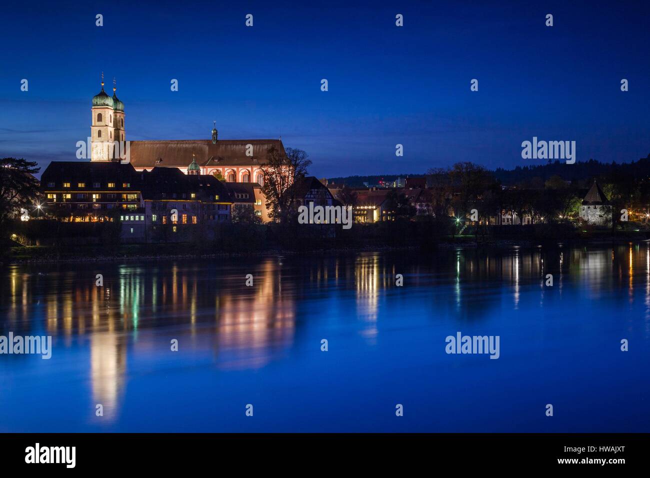 Germany, Baden-Wurttemburg, Black Forest, Bad Sackingen, the 400 year old wooden Rhein River bridge and Munster St. Fridolin, dusk Stock Photo