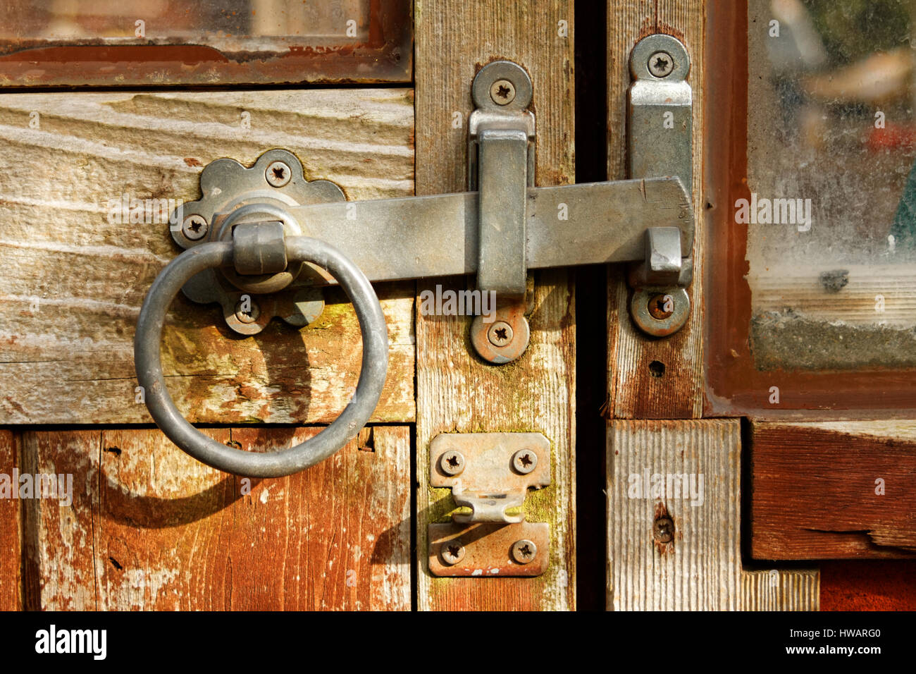 Greenhouse with old lock on wooden door Stock Photo Alamy