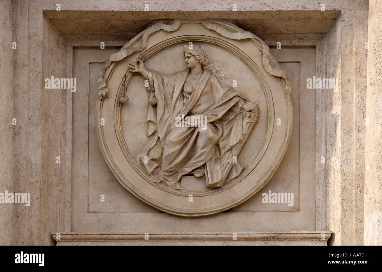 Medallion Justice on the Palazzo Montecitorio, seat of the Italian Chamber of Deputies in Rome, Italy Stock Photo