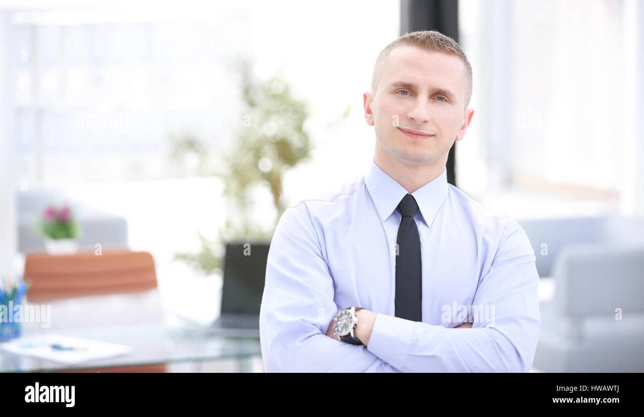 Positive young businessman posing camera hi-res stock photography and ...