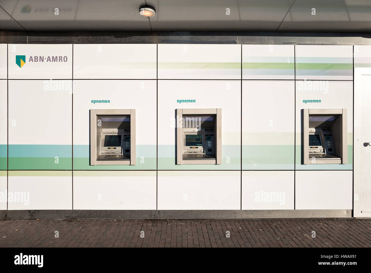 ABN AMRO cash dispensing machines. ABN AMRO is the third-largest bank in the Netherlands. Stock Photo