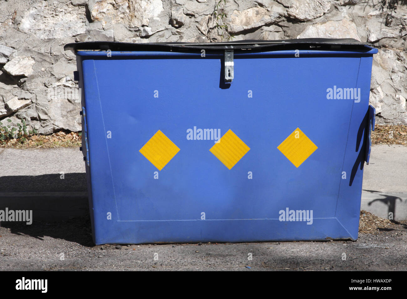 Blue and yellow American litter garbage waste trash bin, container