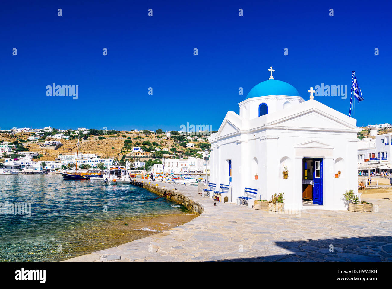 Traditional fishing port of Mykonos in the early summer morning, Mykonos island, Cyclades, Greece Stock Photo