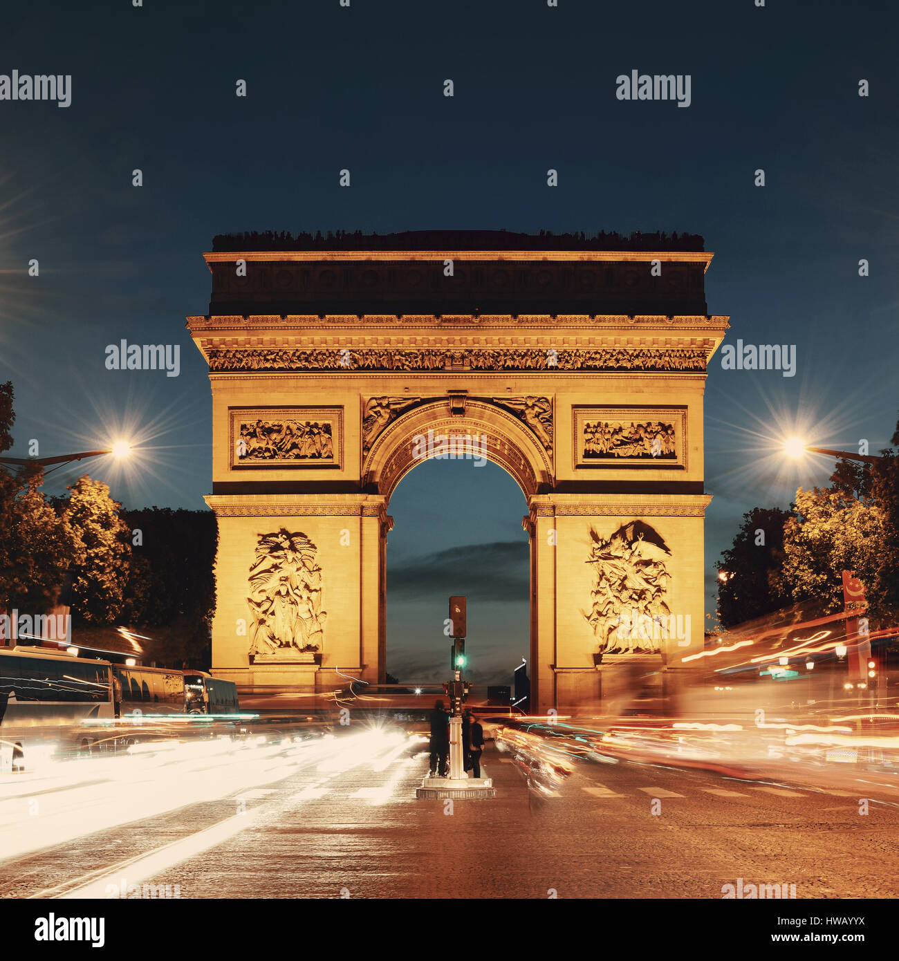 Arc De Triomphe And Street View At Night In Paris France Stock