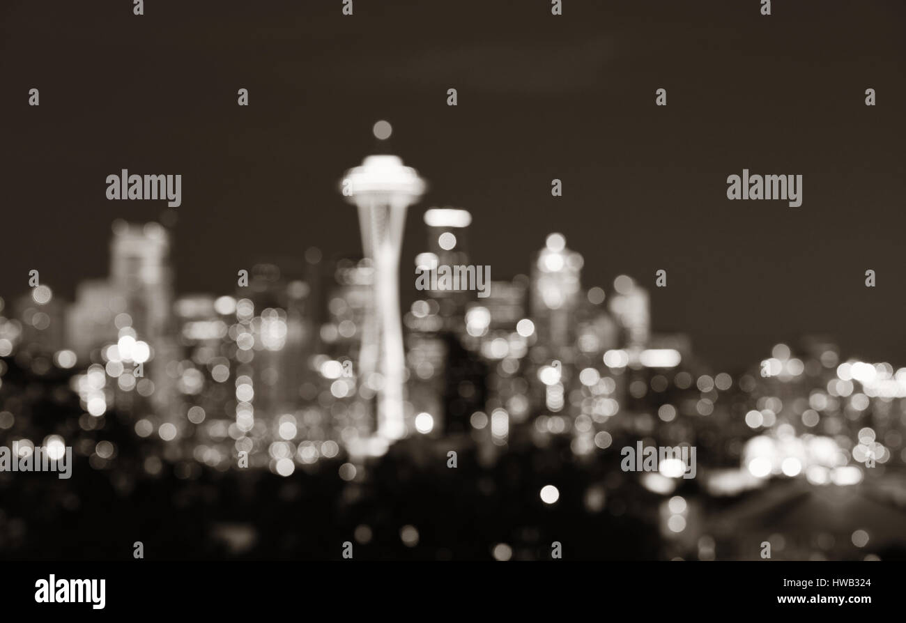 Seattle city skyline at night with urban office buildings viewed from ...