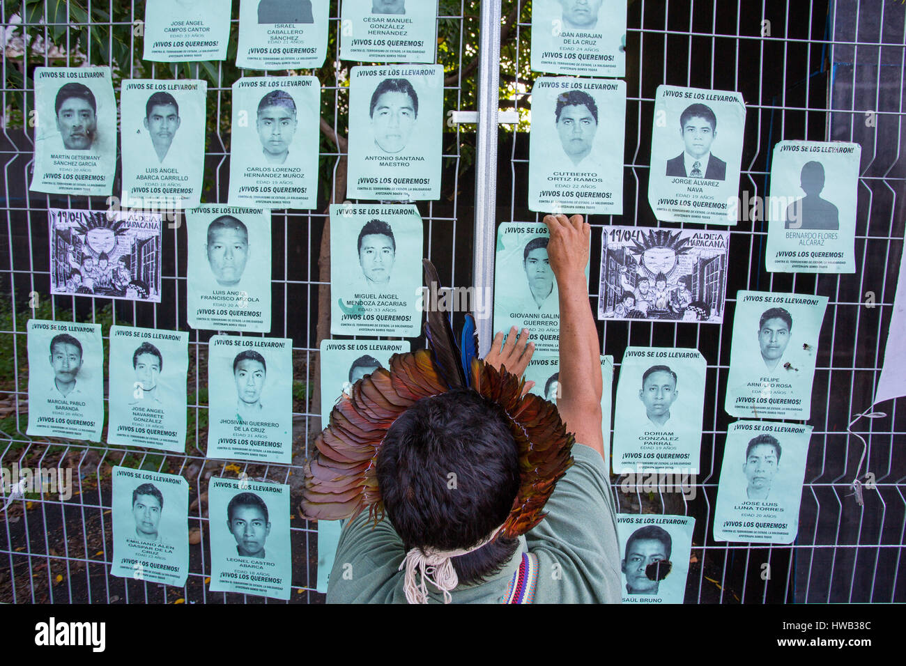 Indian day in Rio de Janeiro, indians put in a wall pictures of people that disappeared in Mexico, Maracanã, Rio de Janeiro, Brazil Stock Photo