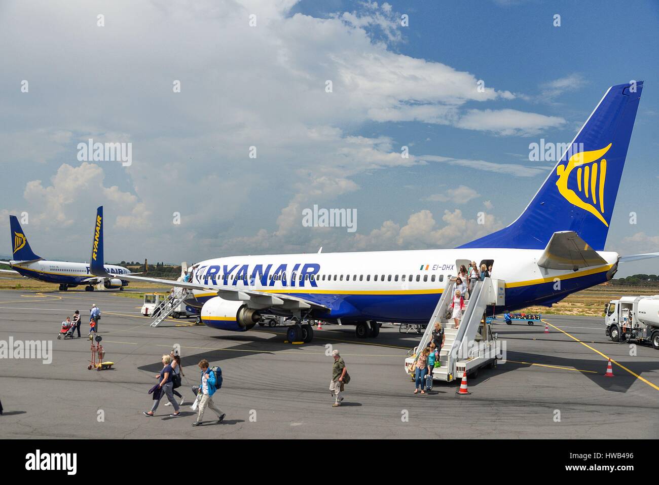 France, Herault, Vias, passengers disembarking from a plane on the tarmac Stock Photo