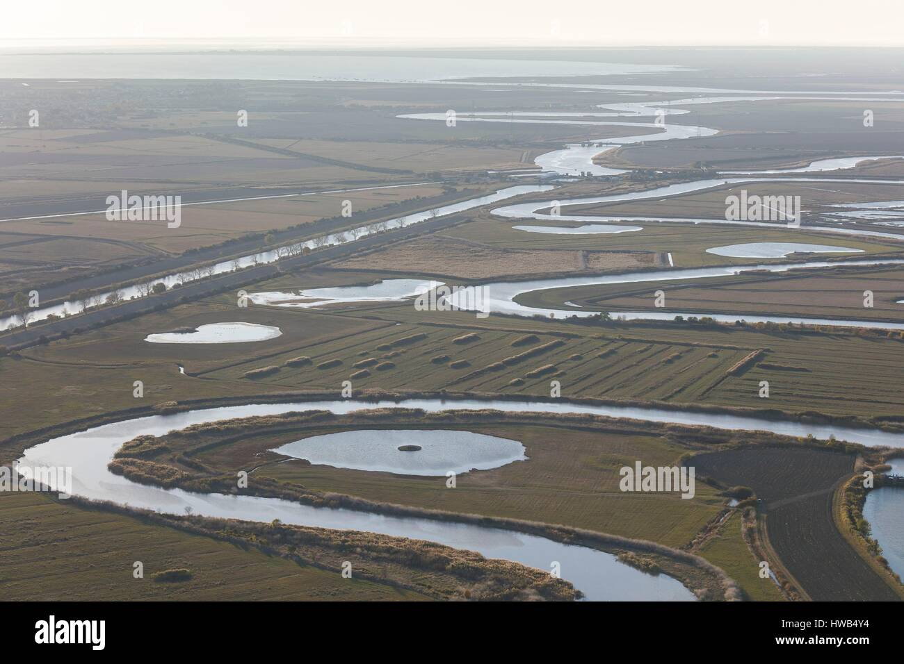 France, Charente Maritime, Marans, la Sevre Niortaise river meanders (aerial view) Stock Photo