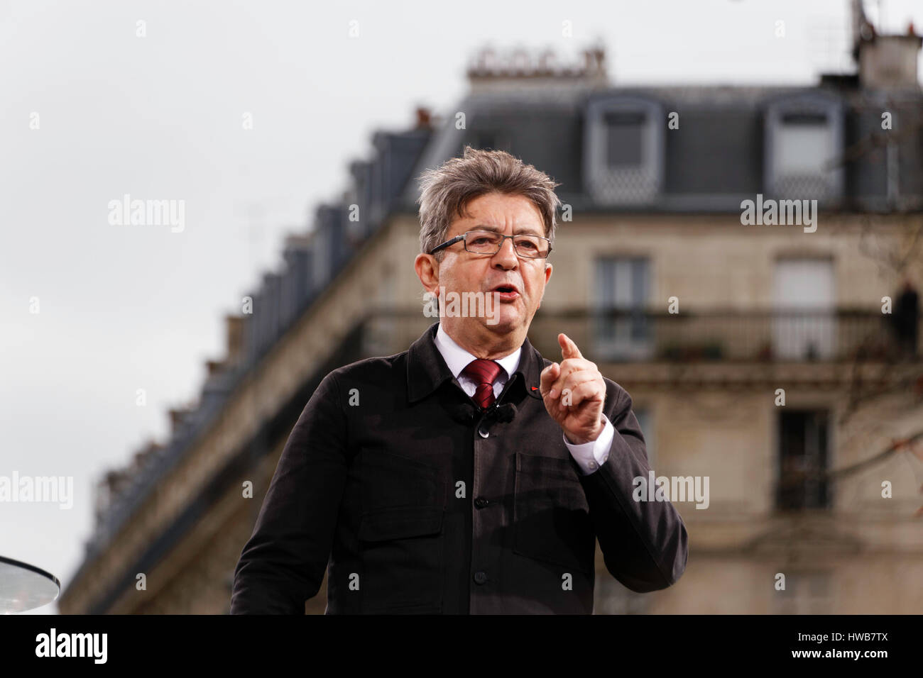 Paris, France. 18th March, 2017. Jean Luc Melenchon, presidential candidate speaks at the arrival of the parade for the 6th republic on the podium of the Place de la République in Paris, France. Credit: Bernard Menigault/Alamy Live News Stock Photo