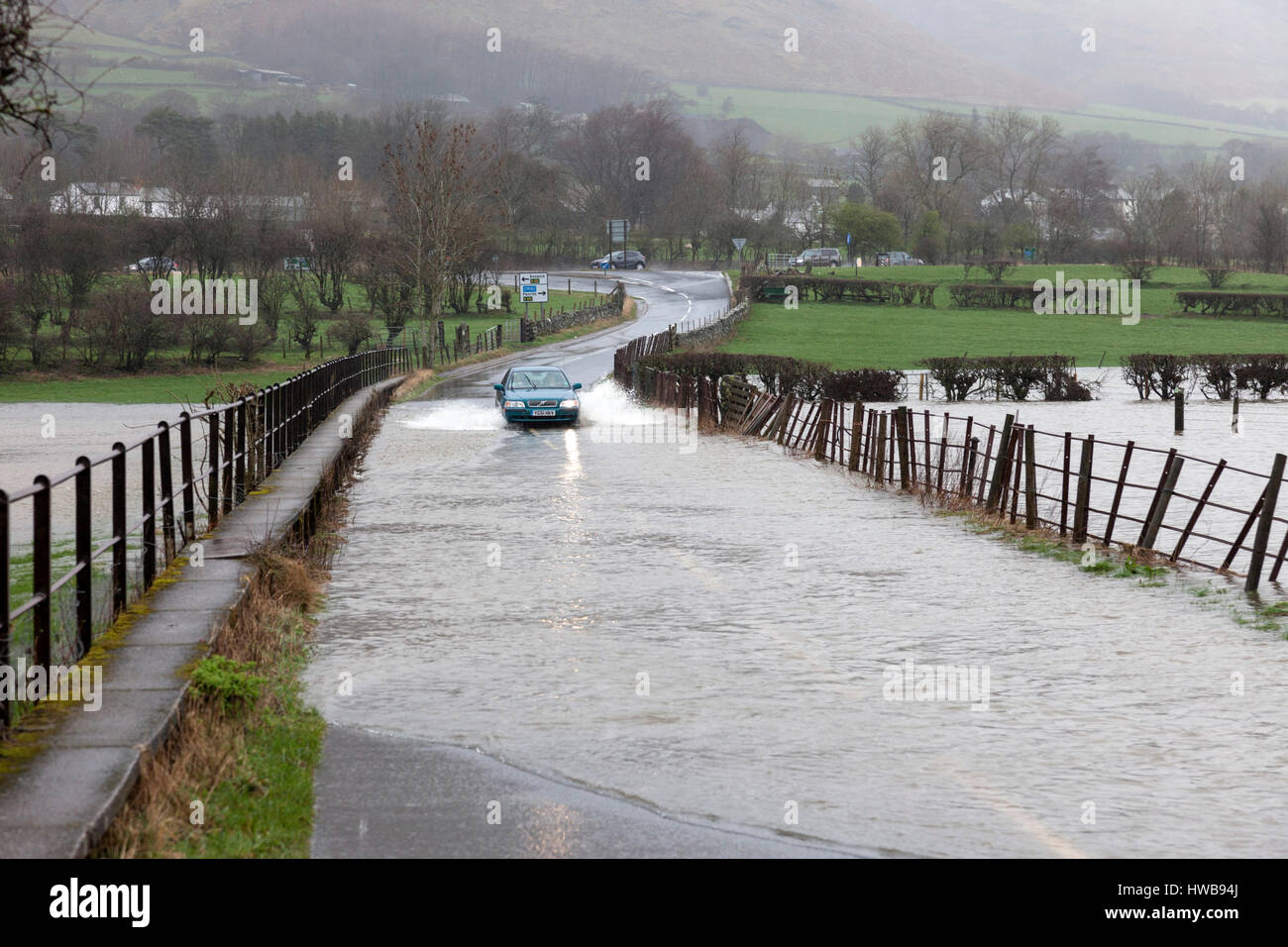 Thelkeld, Lake District, Cumbria UK.  Sunday 19th March 2017.  UK Weather.  Heavy rain has caused flooding in parts of Cumbria today.  This is the B5322 road close to the junction with the A66 near the village of Threlkeld © David Forster/Alamy Live News Stock Photo