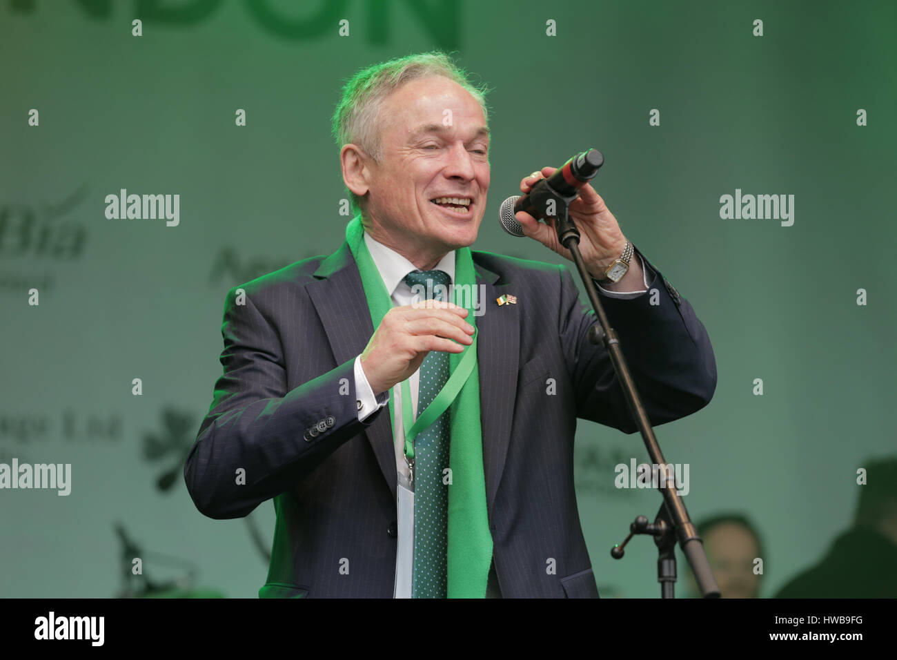 Trafalgar Square, London, UK, 19th March 2017, Richard Bruton addresses crowd at the London St Patrick festival, Richard Bruton, Celebrations of the St Patrick in London's Trafalgar Squarel Credit: Richard Soans/Alamy Live News Stock Photo