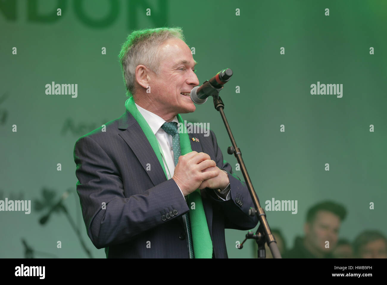 Trafalgar Square, London, UK, 19th March 2017, Richard Bruton addresses crowd at the London St Patrick festival, Richard Bruton, Celebrations of the St Patrick in London's Trafalgar Squarel Credit: Richard Soans/Alamy Live News Stock Photo