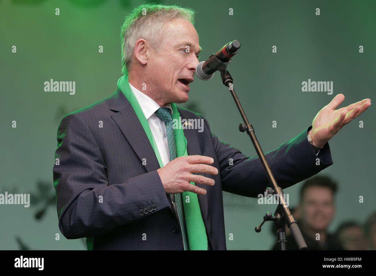 Trafalgar Square, London, UK, 19th March 2017, Richard Bruton addresses crowd at the London St Patrick festival, Richard Bruton, Celebrations of the St Patrick in London's Trafalgar Squarel Credit: Richard Soans/Alamy Live News Stock Photo