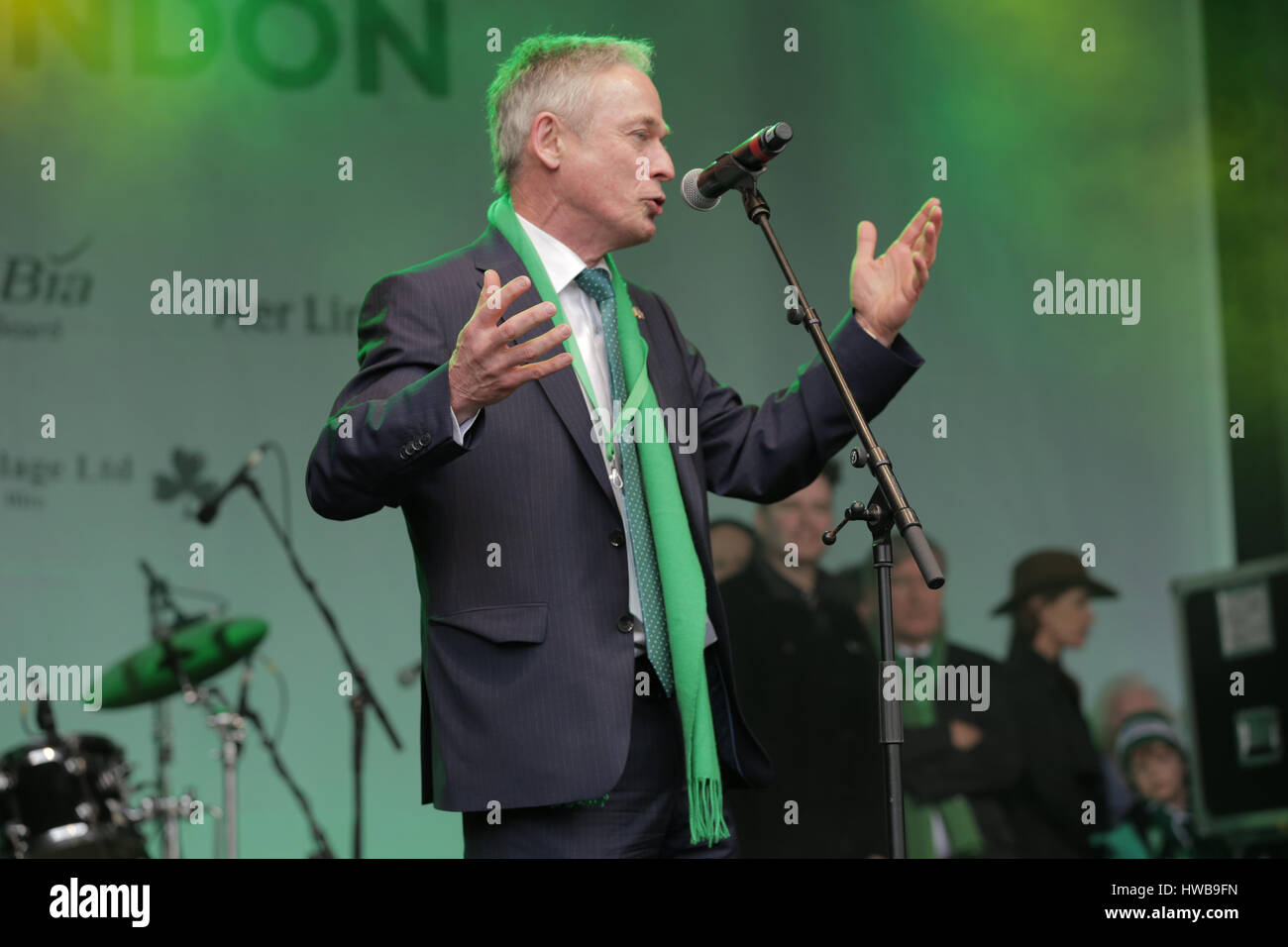 Trafalgar Square, London, UK, 19th March 2017, Richard Bruton addresses crowd at the London St Patrick festival, Richard Bruton, Celebrations of the St Patrick in London's Trafalgar Squarel Credit: Richard Soans/Alamy Live News Stock Photo