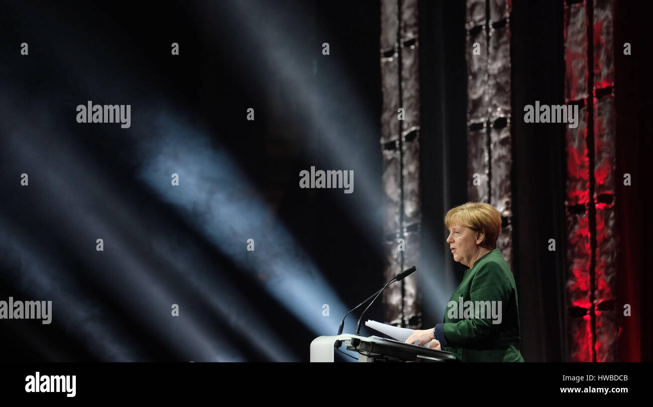 Hanover, Germany. 19th Mar, 2017. German Chancellor Angela Merkel (CDU) speaking at the opening of the CeBIT trade fair in Hanover, Germany, 19 March 2017. Japan is the partner country of the 2017 CeBIT Photo: Peter Steffen/dpa/Alamy Live News Stock Photo
