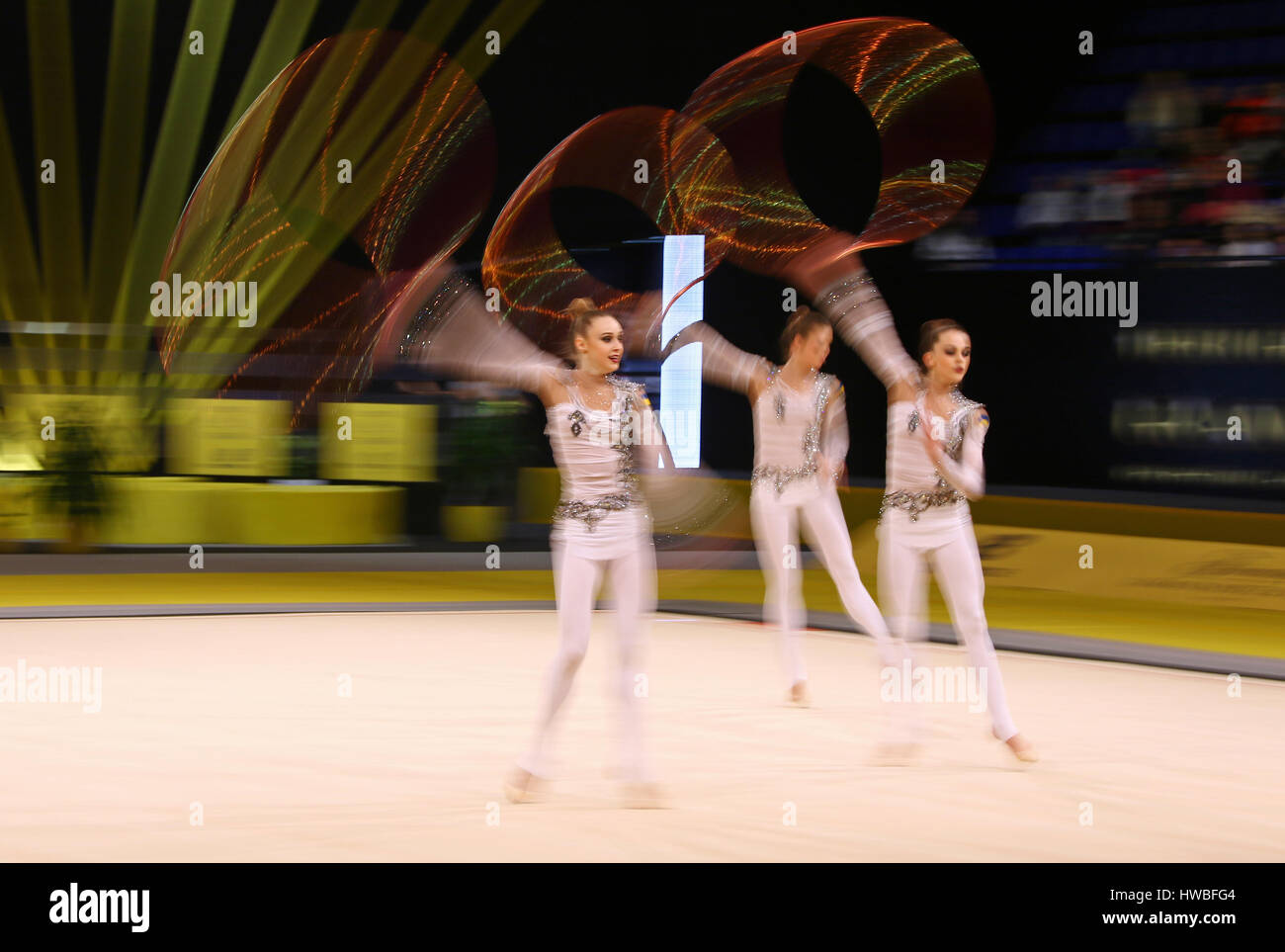 Kiev, Ukraine. 19th March, 2017. Team of Ukraine performs with 5 Hoops during Group Competition of Rhythmic Gymnastics Grand Prix 'Deriugina Cup' in Palace of Sports in Kyiv, Ukraine. Credit: Oleksandr Prykhodko/Alamy Live News Stock Photo
