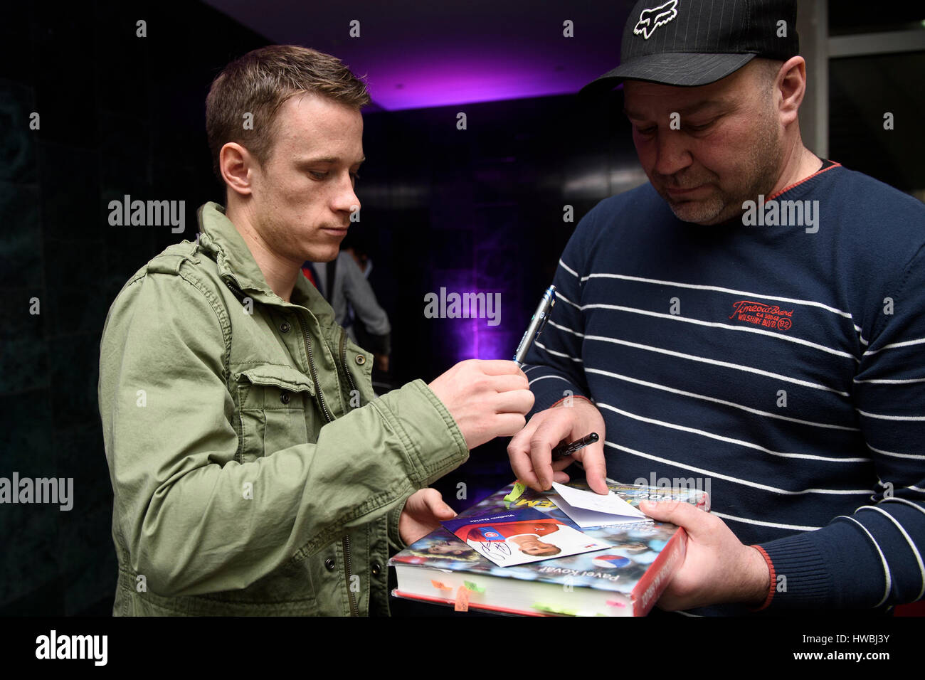 Palyer Jan Sykora gives an autograph to a fan as he arrives to Czech national soccer meeting prior to the friendly match Czech Republic vs Lithuania and World Cup qualification in San Marino, in Prague, Czech Republic, on Monday, March 20, 2017. (CTK Photo/Michal Kamaryt) Stock Photo