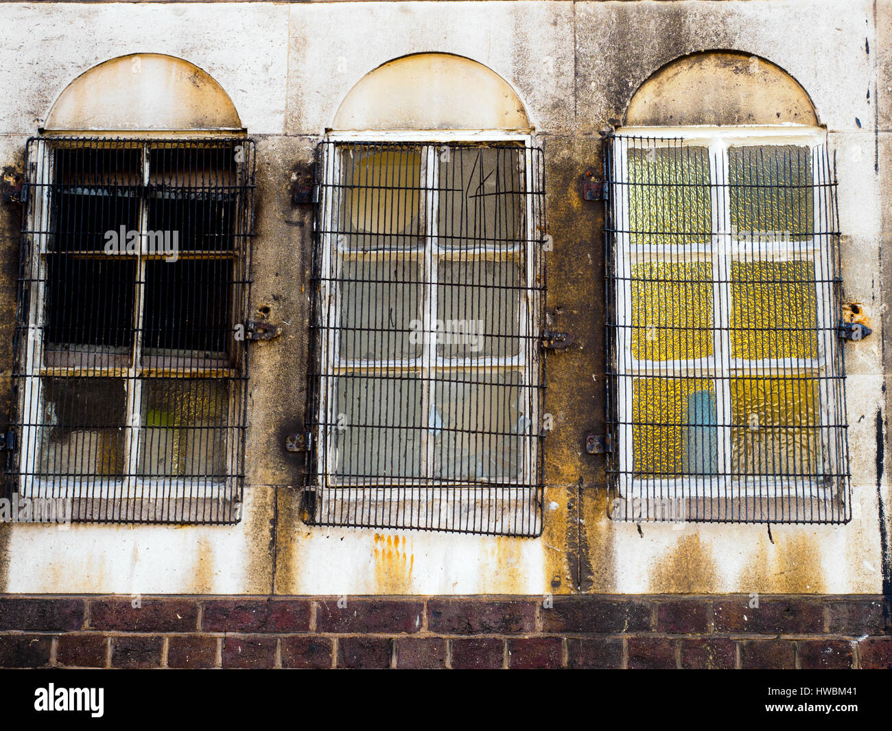 Windows with grate - London, England Stock Photo