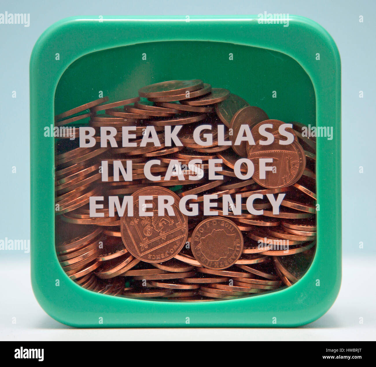 Coins in cash box, London Stock Photo Alamy