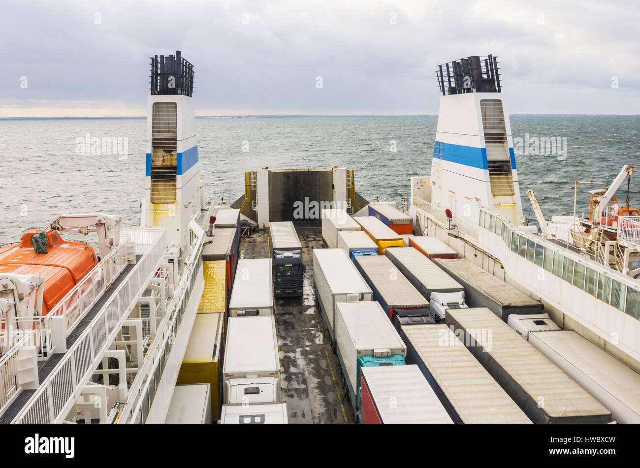 Trucks hosted on a ferry in the sea between Sweden and Finland Stock Photo