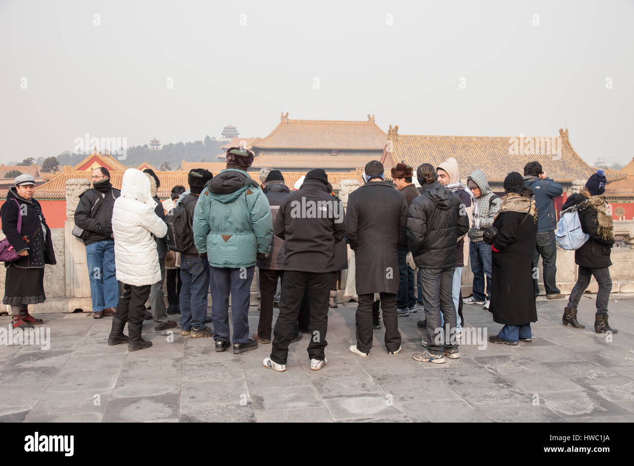Members of a tour group Visiting The Forbidden city Beijing China Stock Photo
