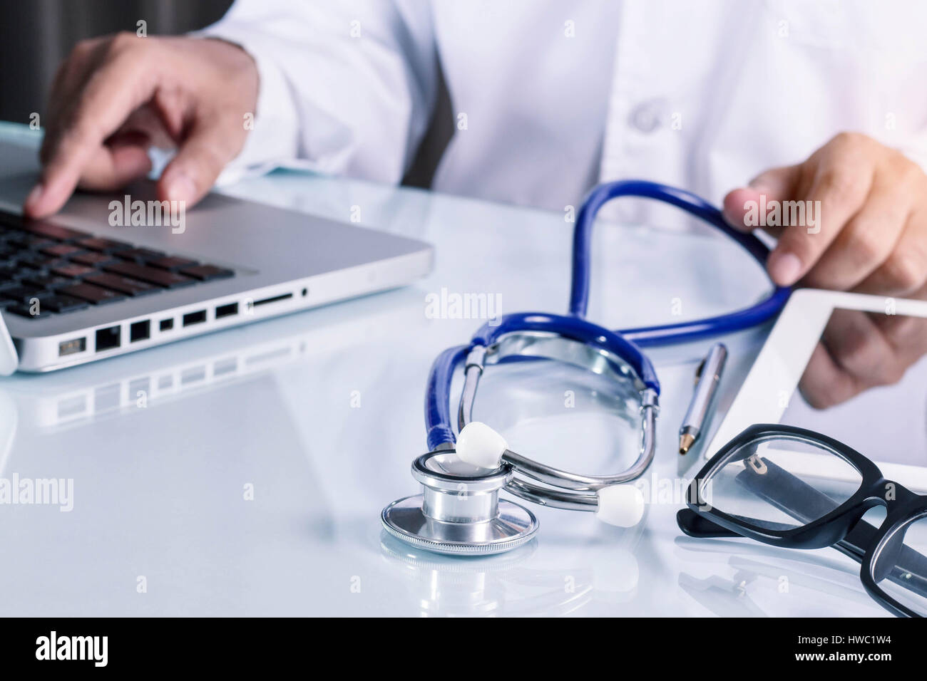 tools of doctor and equipment on the desk Stock Photo Alamy