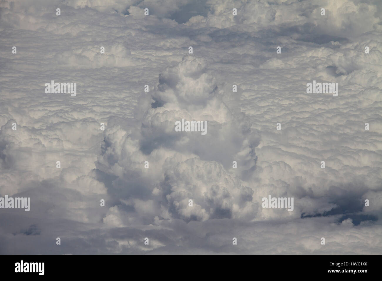 View above fluffy clouds at high altitude China Stock Photo