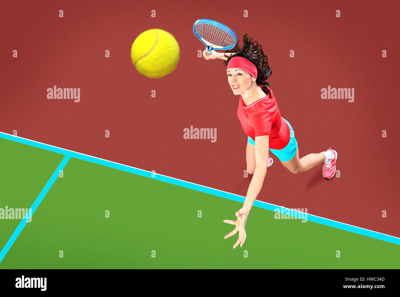 a female tennis player in action on the court Stock Photo